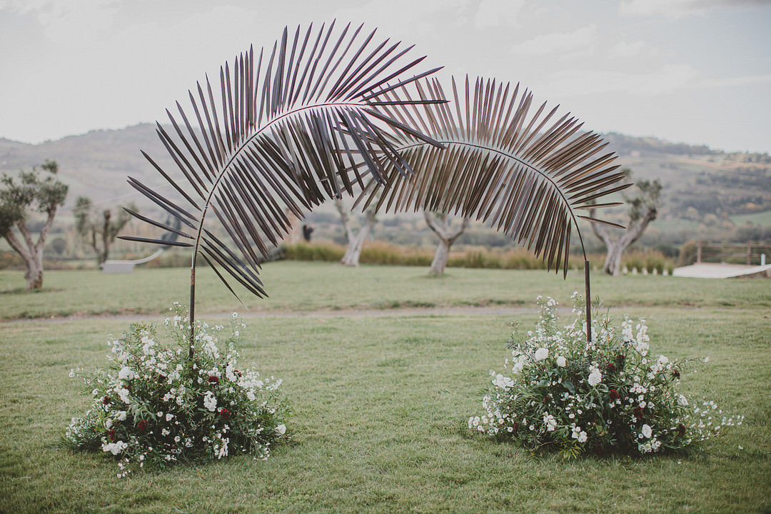 Palm Backdrop Ceremony Aisle Flowers Whimsical Tuscany Wedding Sofia Balli