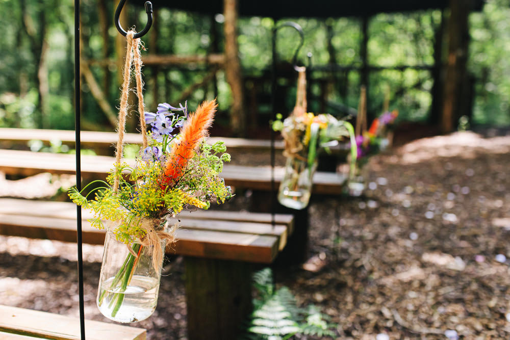 Cheshire Woodland Weddings Jessica O’Shaughessy Wedding Photography Pew End Jar Flowers Aisle