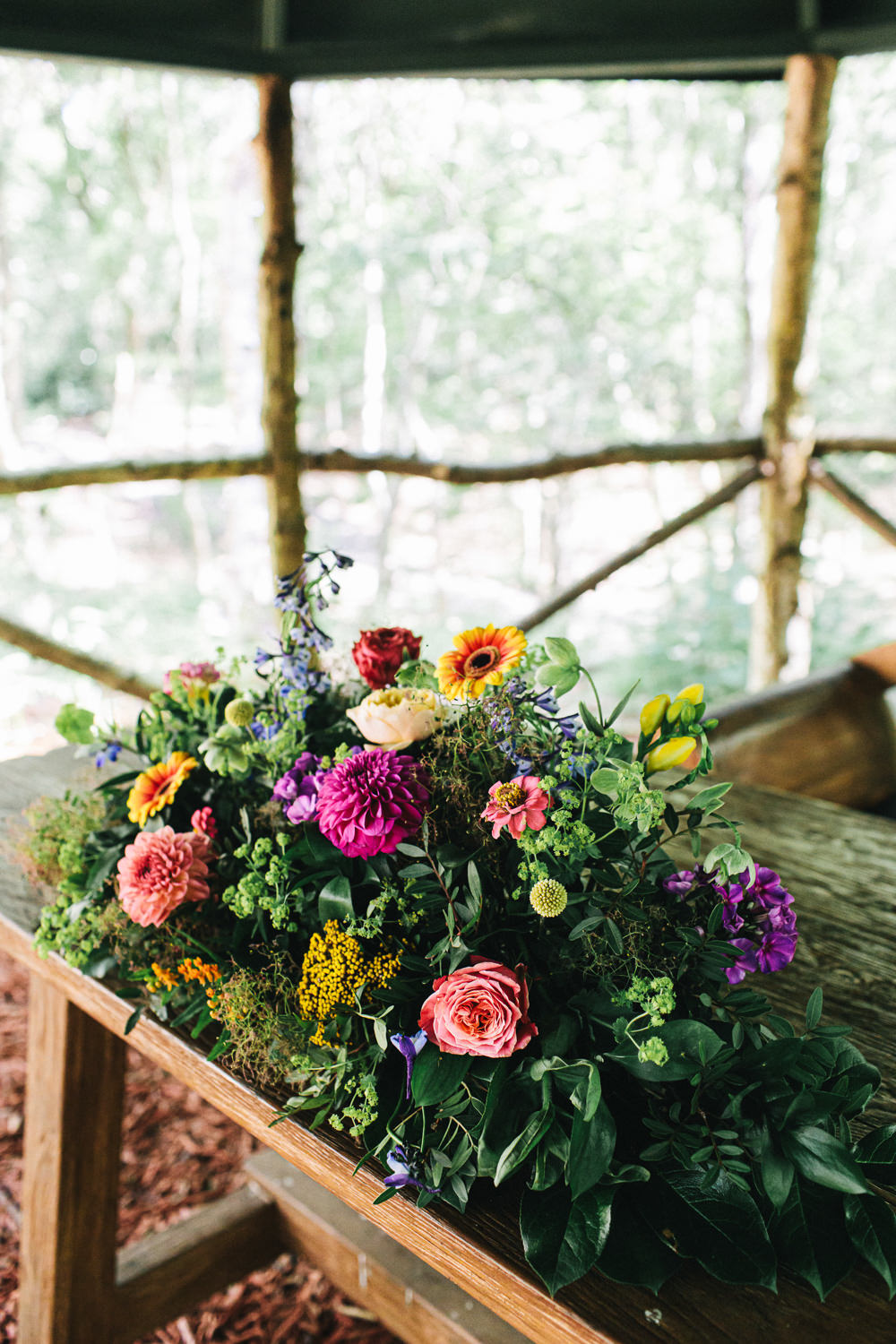 Ceremony Table Flowers Colourful Bright Cheshire Woodland Weddings Jessica O’Shaughessy Wedding Photography