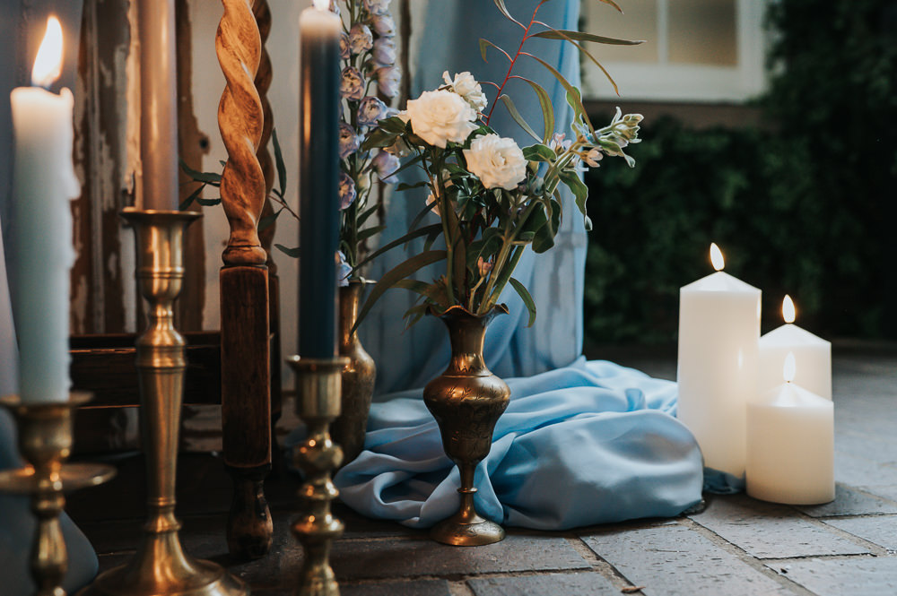 Candles Flowers Decor Dusky Blue Wedding SJP Photography