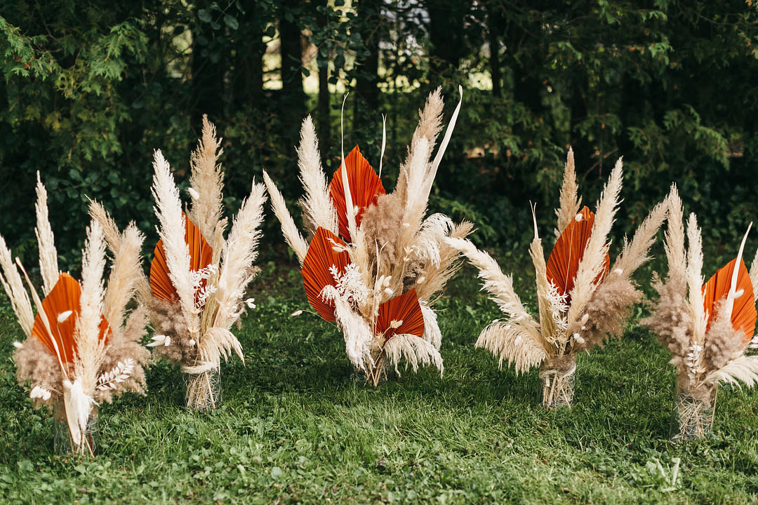 Flowers Arragement Ceremony Pampas Grass Palm Leaf Ontario Micro Wedding Cacie Carroll Photography