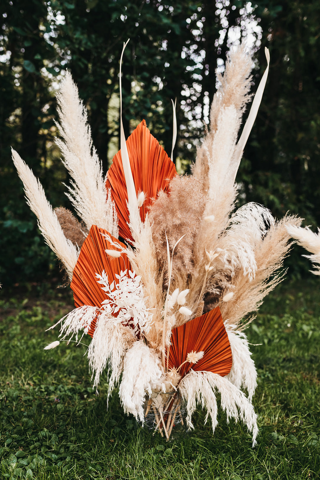 Flowers Arragement Ceremony Pampas Grass Palm Leaf Ontario Micro Wedding Cacie Carroll Photography