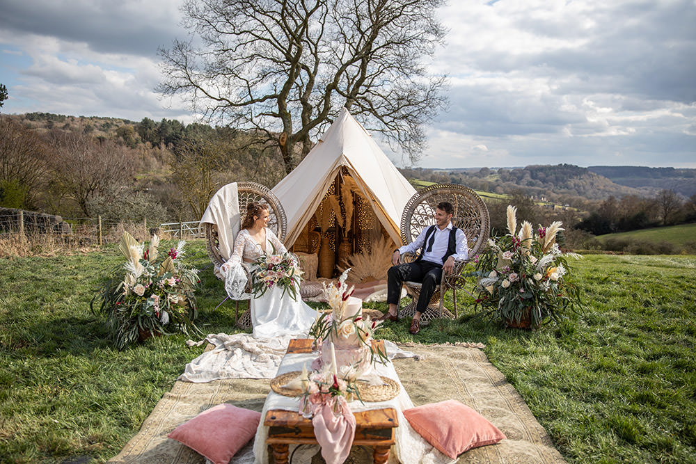 Bell Tent Tipi Peacock Chairs Rug Flowers Boho Decor Field Wedding Sarita White Photography