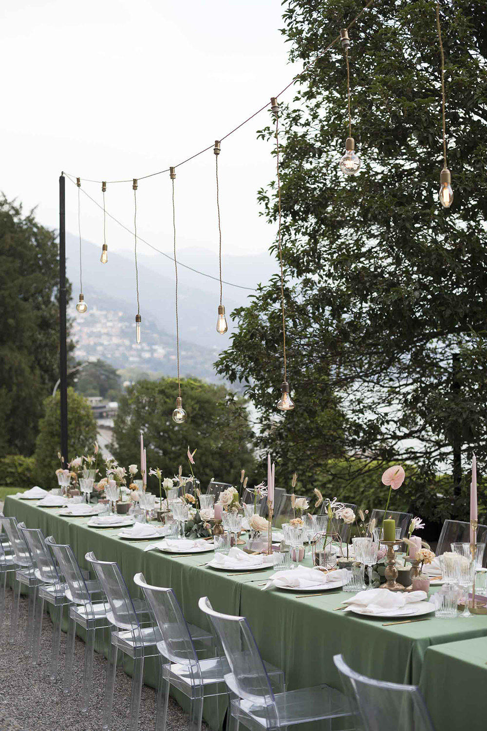 Table Decor Flowers Ghost Chairs Modern Festoon Lights Green Pink Villa del Grumello Wedding L’Ordine della Giarrettiera