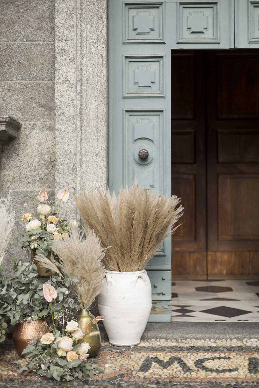Ceremony Church Entrance Door Flowers Pampas Grass Villa del Grumello Wedding L’Ordine della Giarrettiera