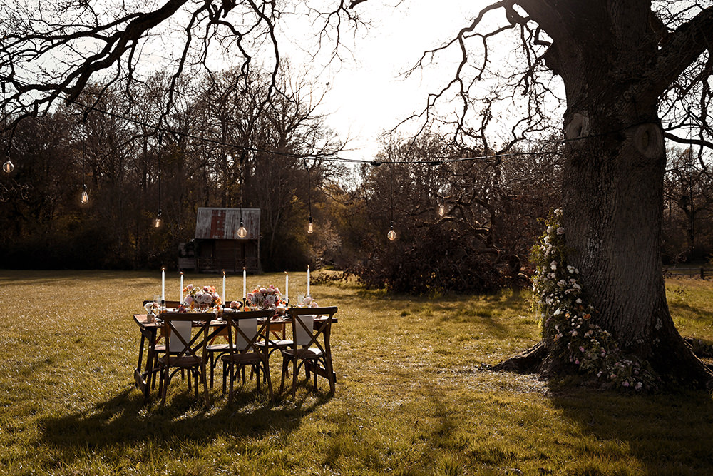 Outdoor Reception Table Coral Peach Flowers Candles Wooden Wedding Ideas Emily Montay