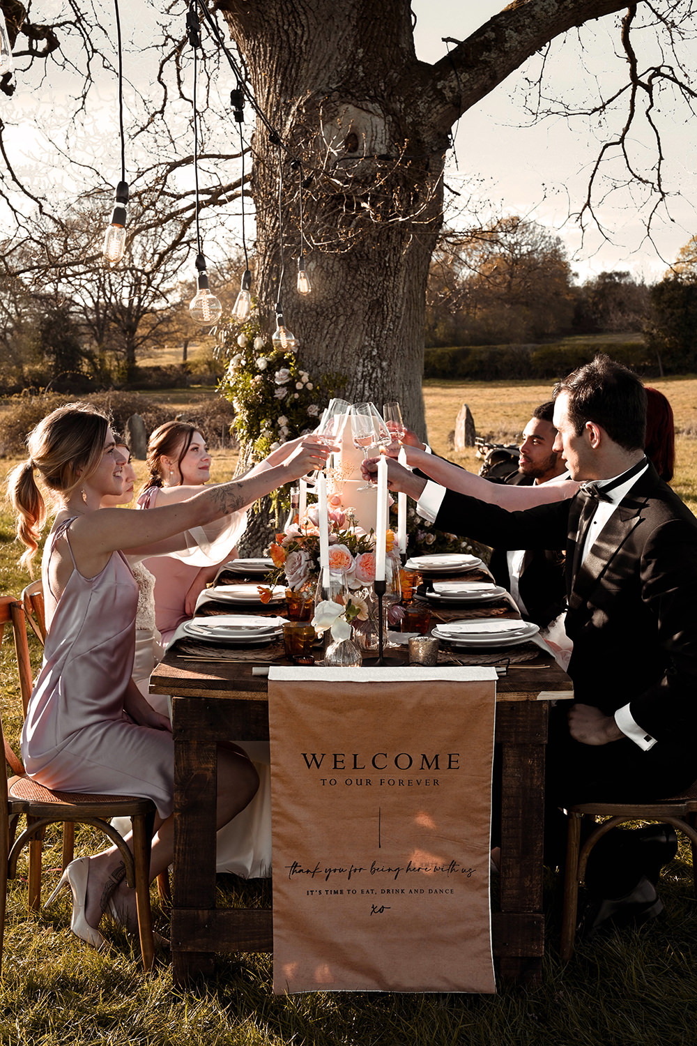 Outdoor Reception Table Coral Peach Flowers Candles Banner Wooden Wedding Ideas Emily Montay