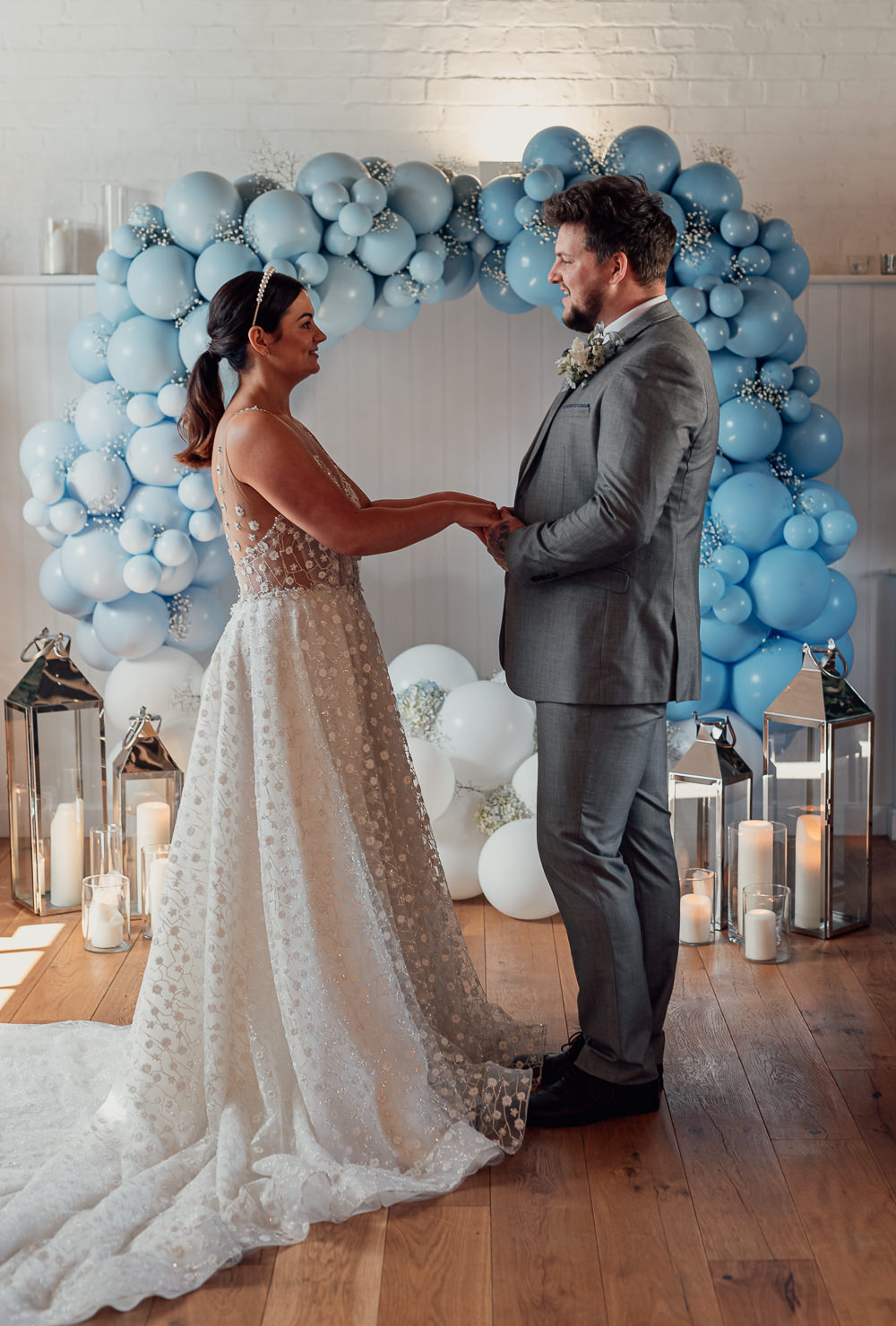 Blue Spring Wedding Clare Smith Photography Balloon Moongate Ceremony Aisle Backdrop Candles