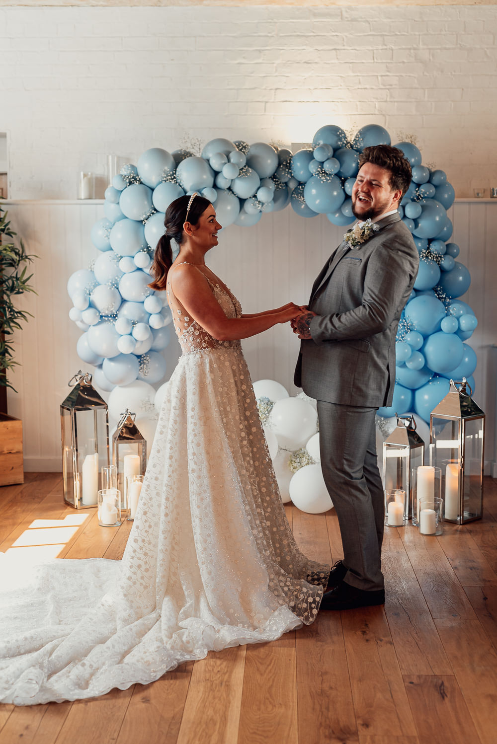 Blue Spring Wedding Clare Smith Photography Balloon Moongate Ceremony Aisle Backdrop Candles