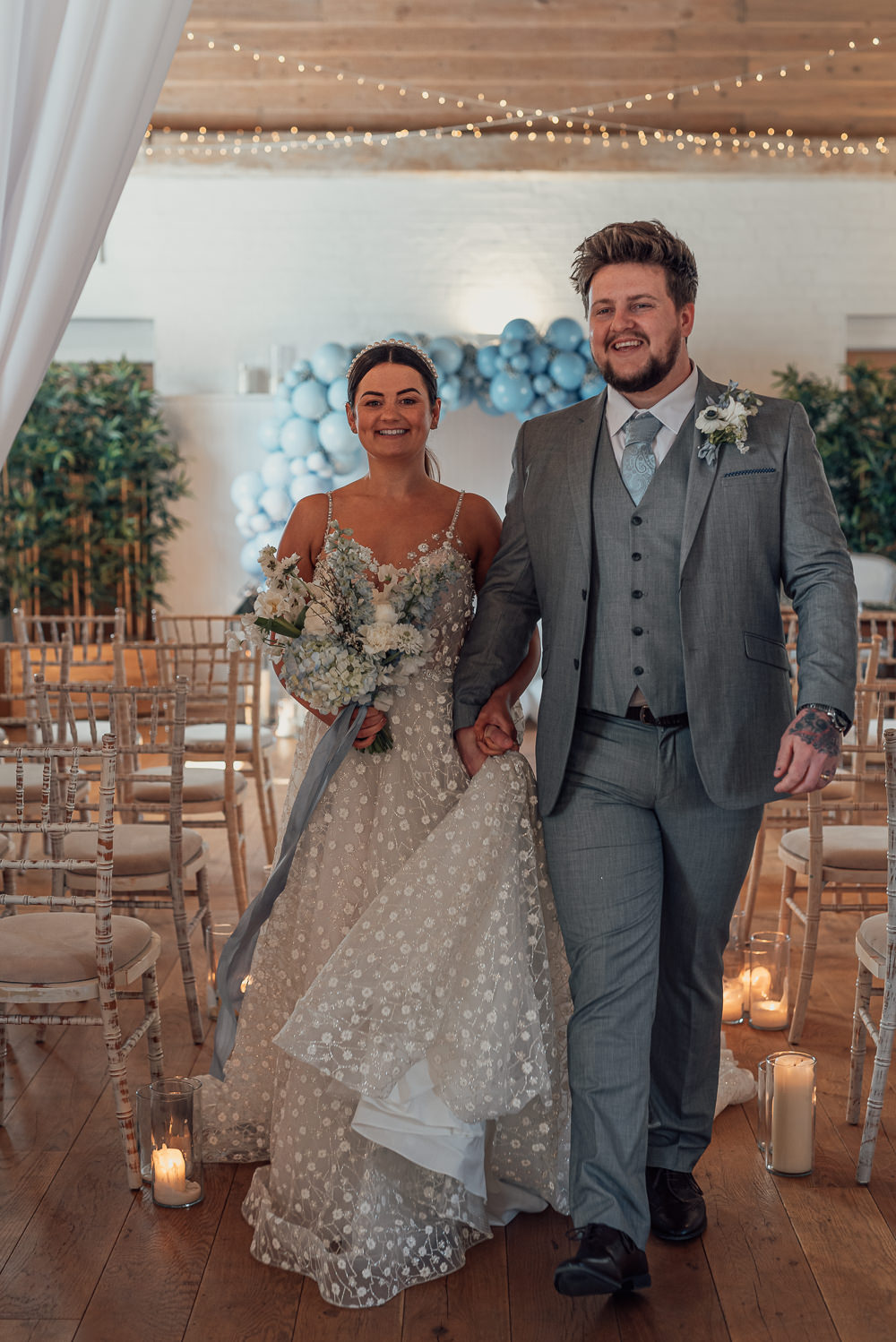 Blue Spring Wedding Clare Smith Photography Balloon Moongate Ceremony Aisle Backdrop Candles