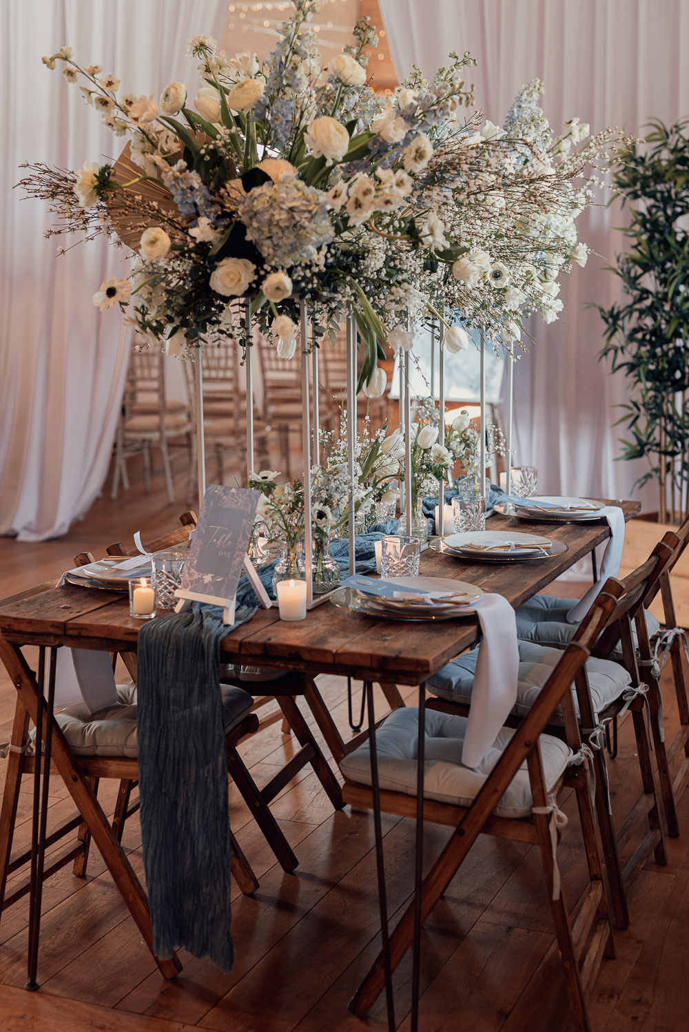 Table Decor Tablescape Wooden Chairs Tall Flowers Candles Blue Spring Wedding Clare Smith Photography