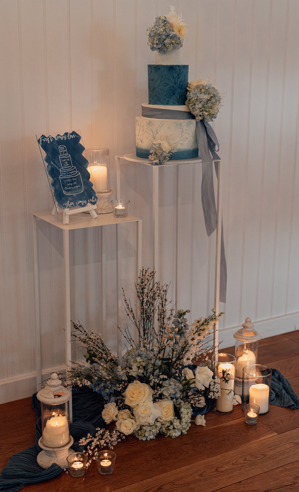 Three Tier Painted Cake Flowers Ribbon Table Candles Blue Spring Wedding Clare Smith Photography