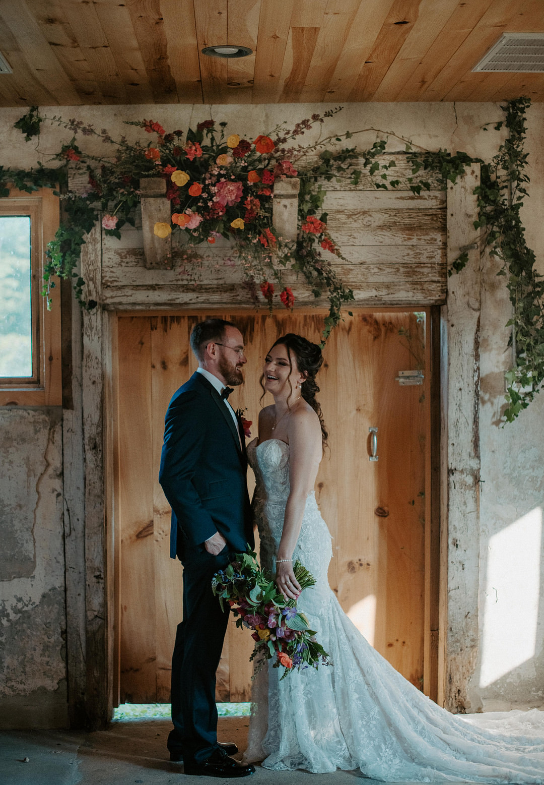 Flower Installation Doorway Ceremony Aisle Colourful Farm Wedding McKenna Rhyne Photography