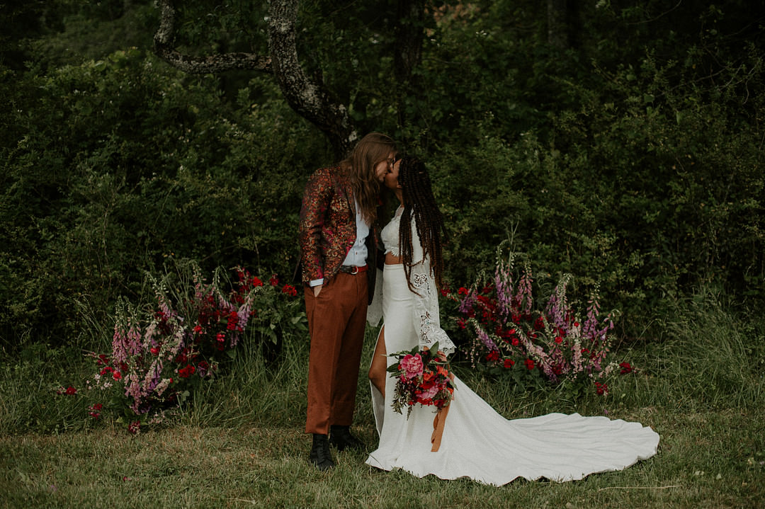 Colourful Farm Wedding McKenna Rhyne Photography Meadow Flowers Backdrop Installation