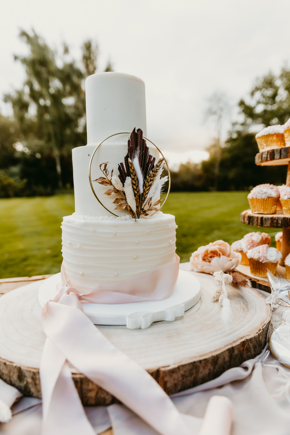 Buttercream Cake Dried Flowers Hoop Pink Ribbon Small Tent Wedding Emberwood Photography