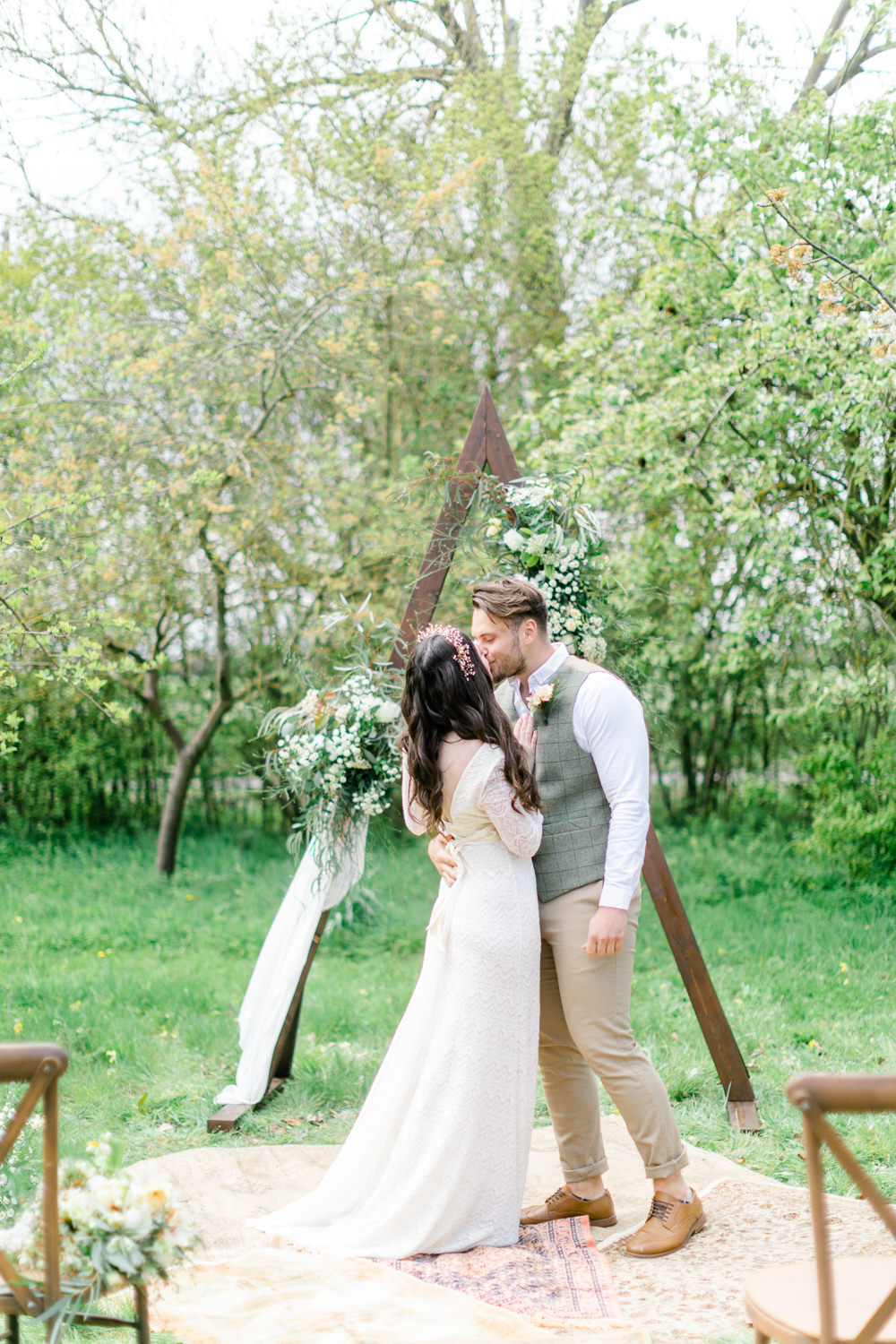 Triangle Arch Backdrop Ceremony Flowers Rug Aisle Boho Spring Wedding Jessica Holt Photography