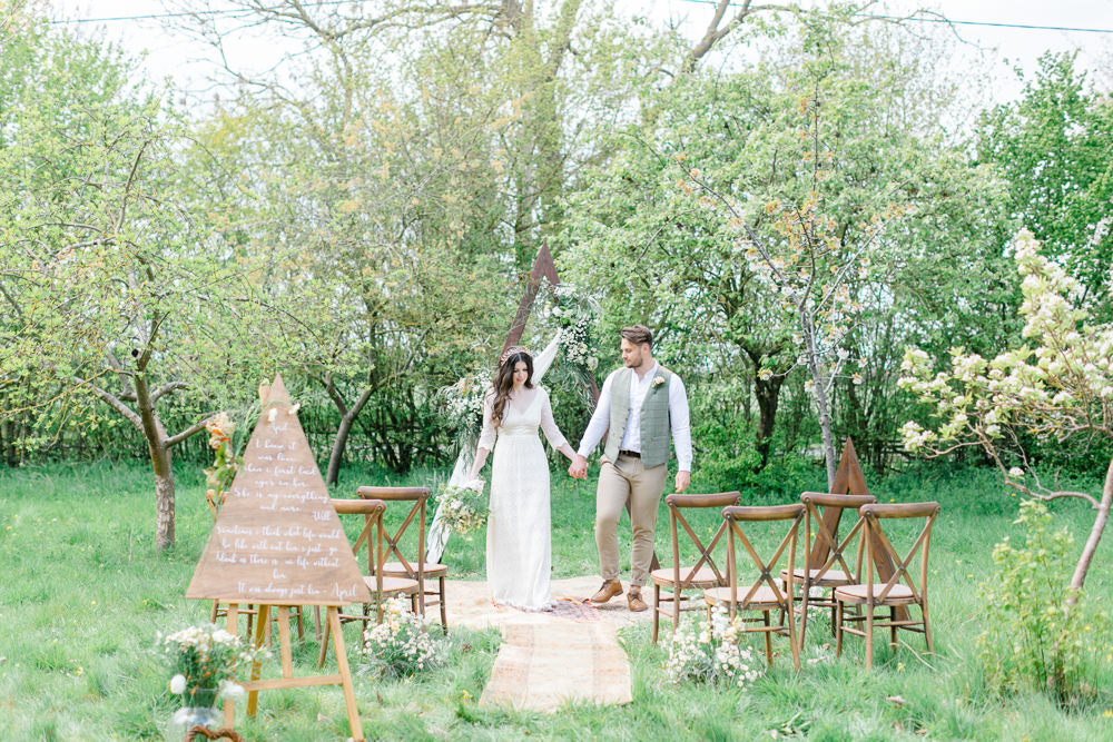 Triangle Arch Backdrop Ceremony Flowers Rug Aisle Boho Spring Wedding Jessica Holt Photography