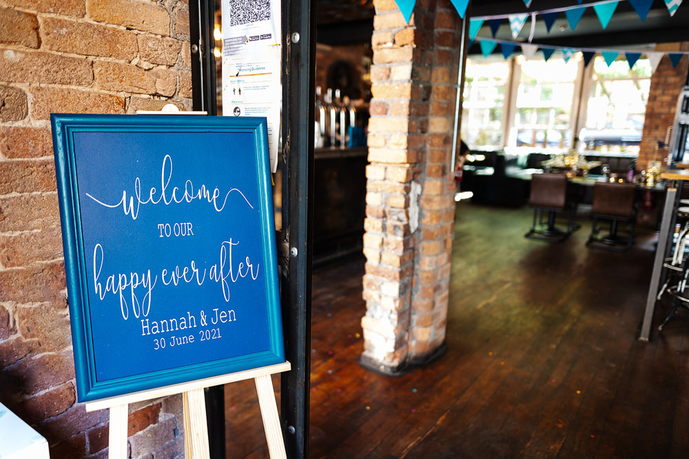 Blue Welcome Sign Clockworks Wedding Liverpool Rachel Burt Photography