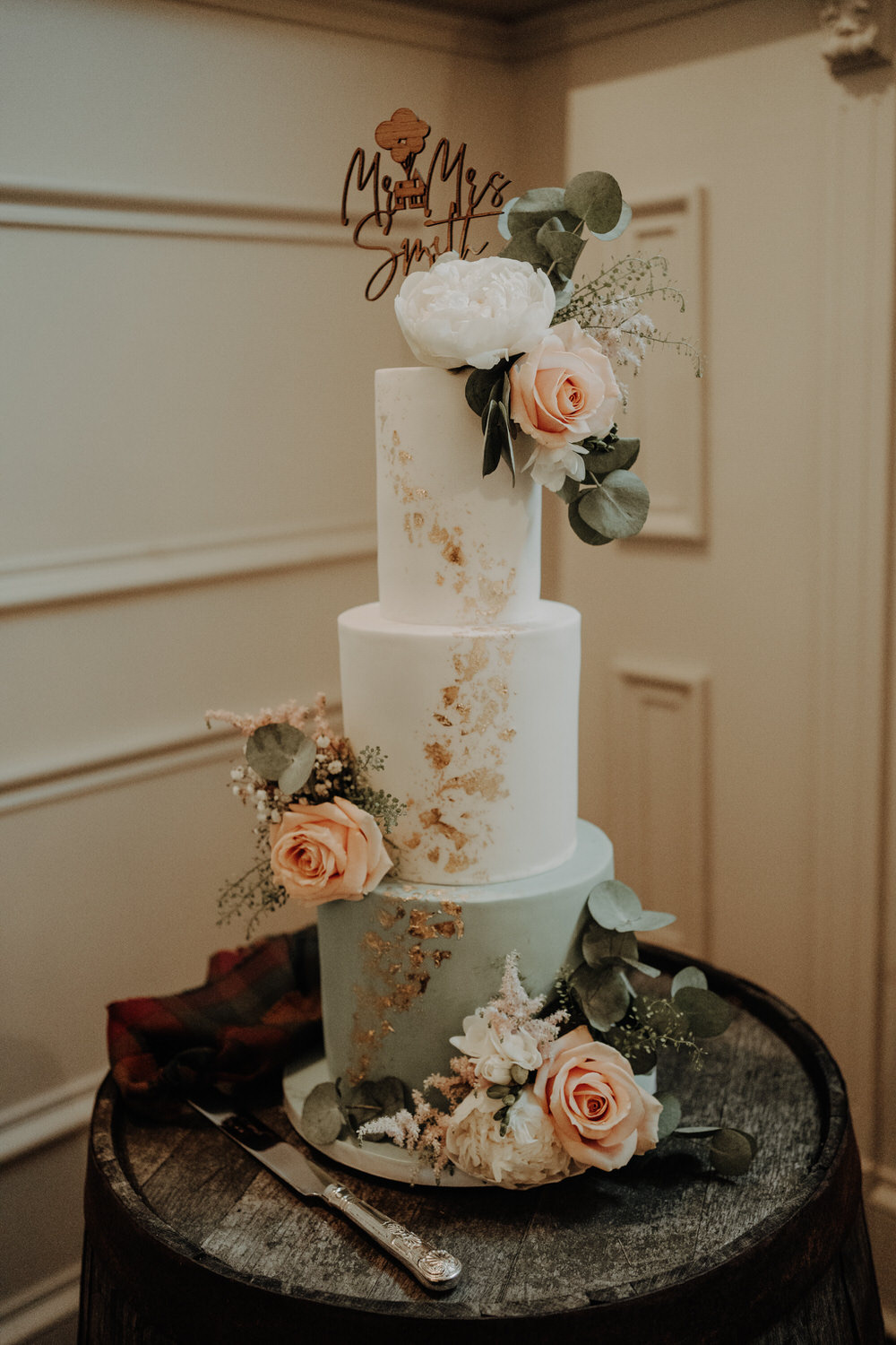 Tall Three Tier Cake Sage Green Flowers Gold Leaf Wooden Topper Netherdale House Wedding Danielle Leslie Photography