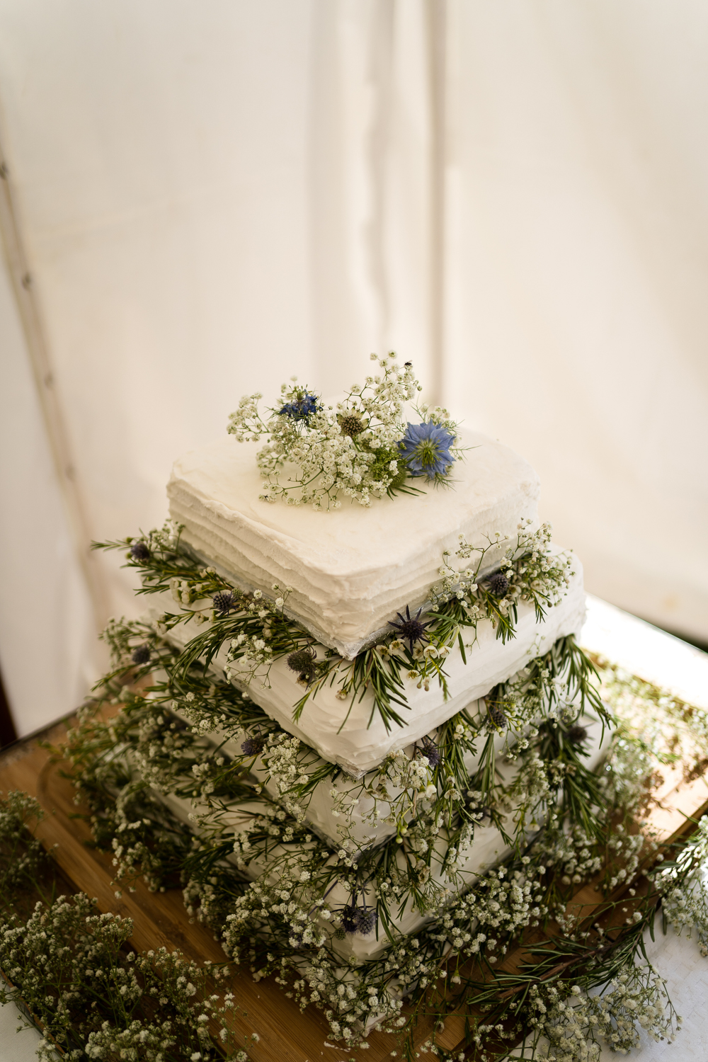 Square Tier Cake Icing Greenery Suffolk Field Wedding Him and Her Wedding Photography