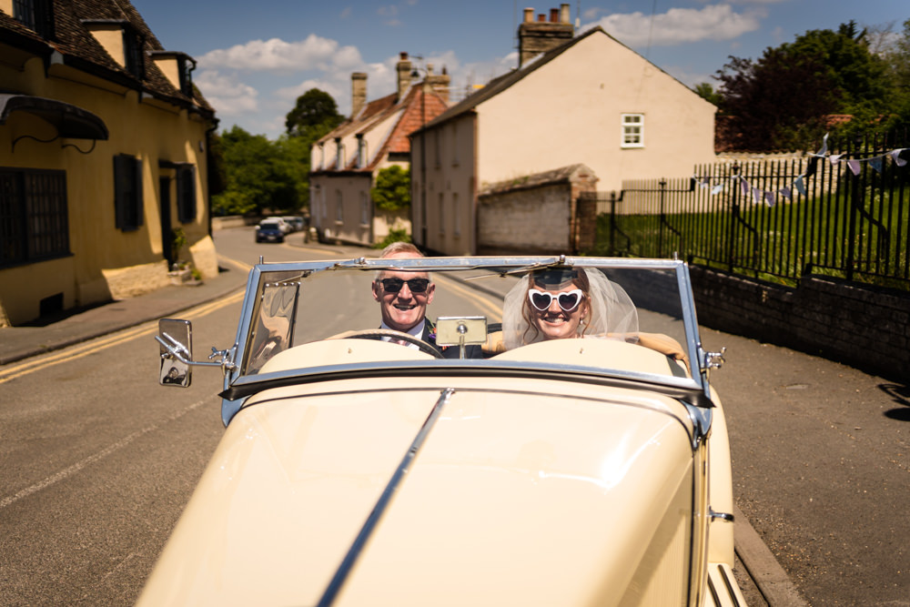 Classic Car Yellow Swaffham Prior Village Hall Wedding Him and Her Wedding Photography