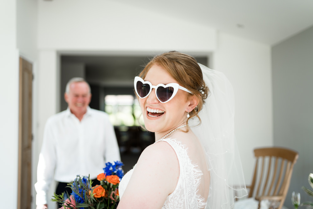 Bride Bridal Sunglasses Swaffham Prior Village Hall Wedding Him and Her Wedding Photography