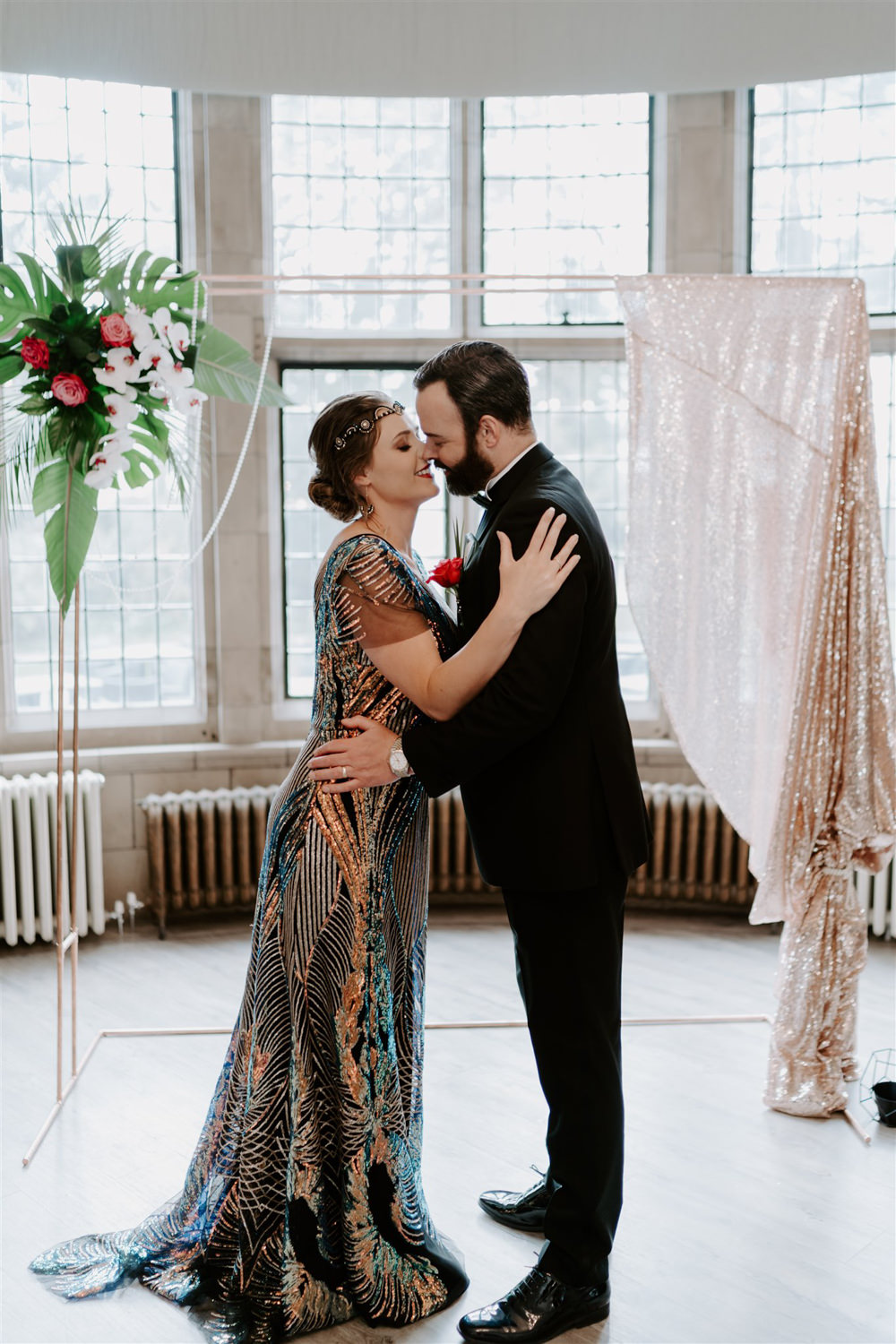 1920s Wedding Ideas Gina Fernandes Photography Ceremony Arch Backdrop Gold Sequins Flowers