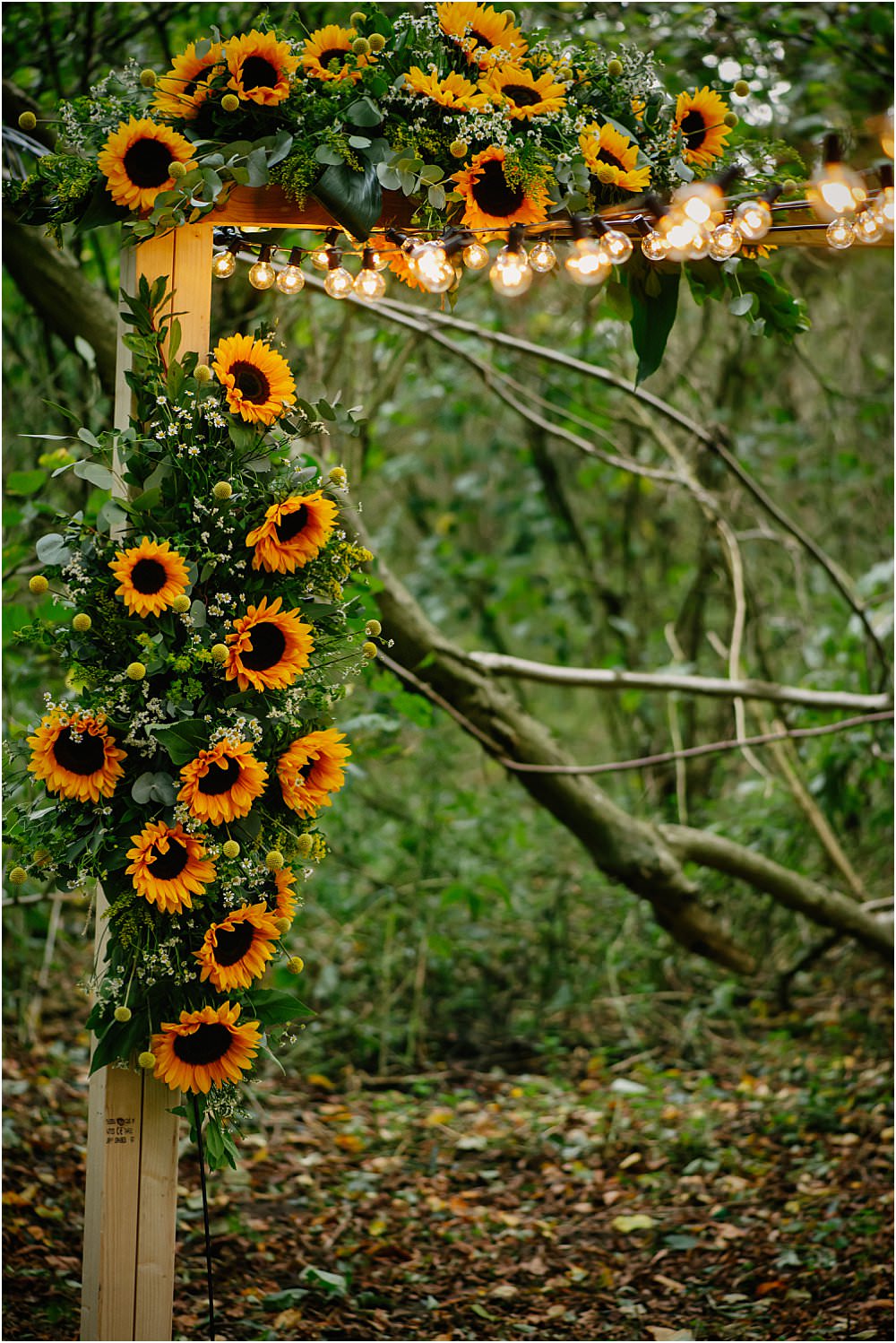 Sunflower Arch Ceremony Fairy Lights Athelington Hall Wedding Lily Sawyer Photography