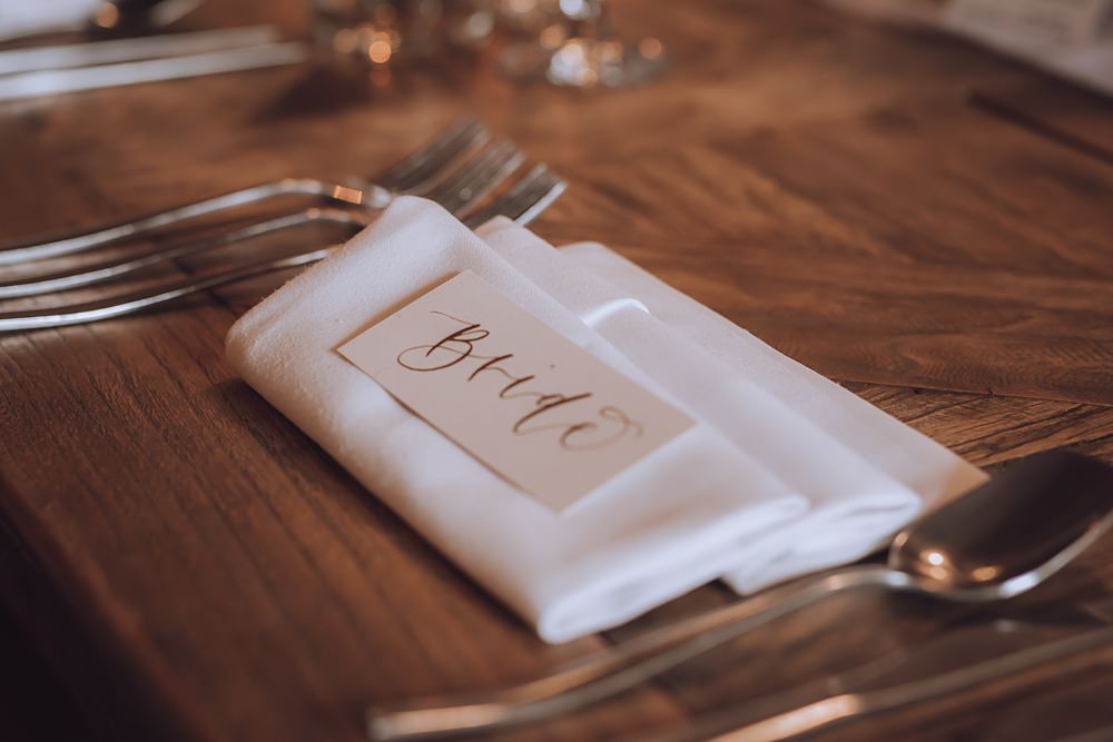Blue Pigeons Wedding Charlotte Claricoat Photography Place Name Gold Calligraphy