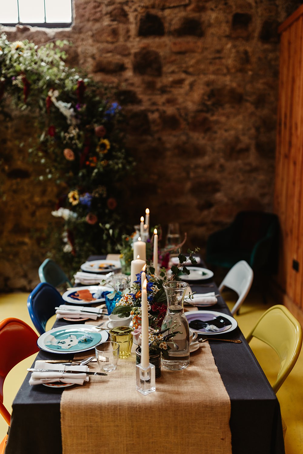 Colourful Chairs Table Decor Dog Plates Candles Flowers Tin Can Glen Dye Wedding Emma Lawson Photography