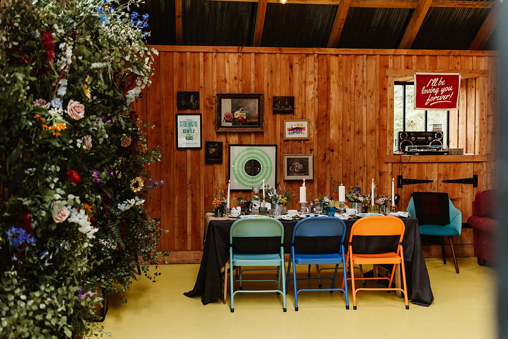 Colourful Chairs Table Decor Dog Plates Candles Flowers Tin Can Glen Dye Wedding Emma Lawson Photography