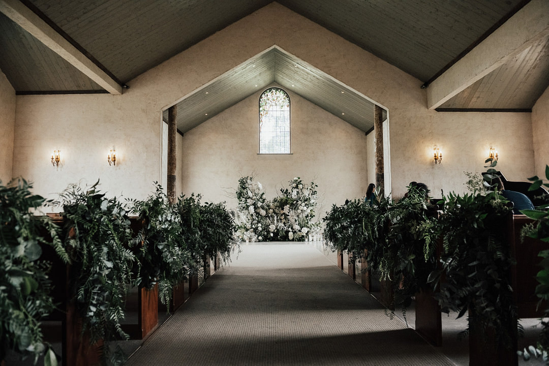 Ceremony Flower Installation Backdrop White Greenery Aisle Pew End Stones of the Yarra Valley Wedding Rick Liston Photography