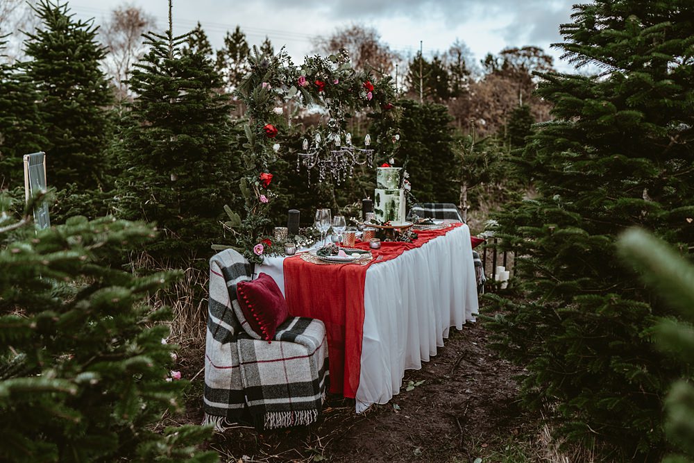 Table Tablescape Decor Spruce Pine Greenery Red Green Candles Christmas Tree Farm Wedding Adrianna Piorun Photography