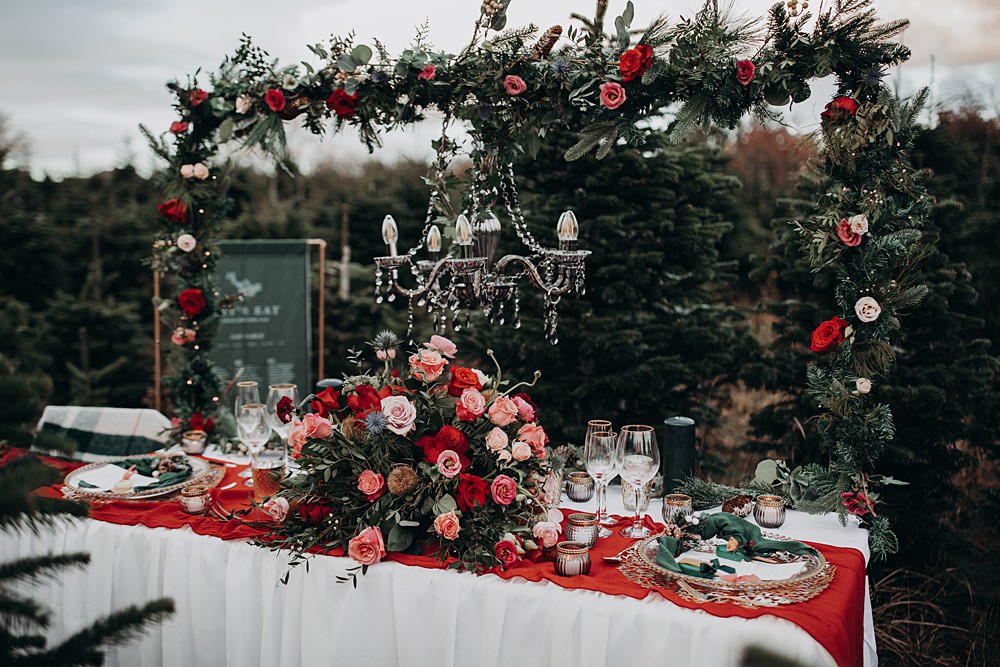 Table Tablescape Decor Spruce Pine Greenery Red Green Candles Christmas Tree Farm Wedding Barbara Markiewicz Photography