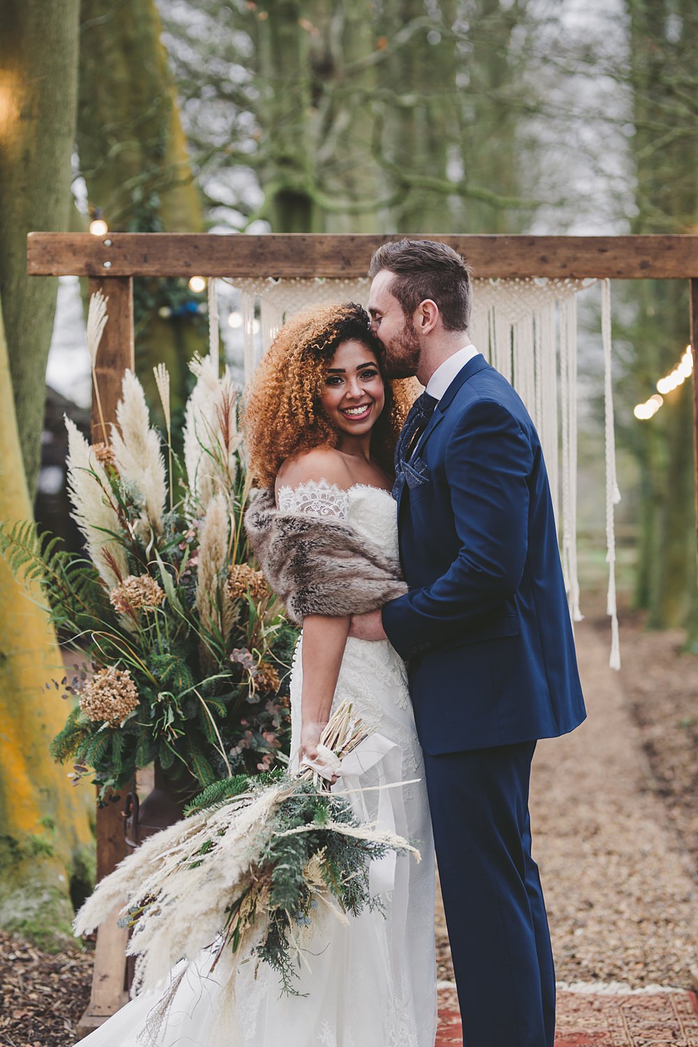 Woodland Ceremony Rug Aisle Wooden Frame Macrame Backdrop Festoon Lights Christmas Wedding Ideas Mini and Me Photography