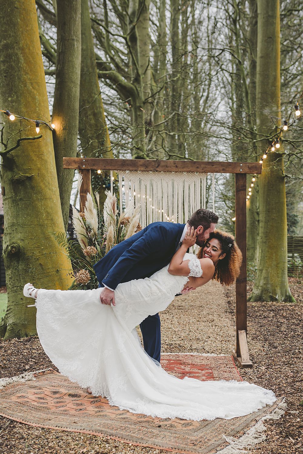 Woodland Ceremony Rug Aisle Wooden Frame Macrame Backdrop Festoon Lights Christmas Wedding Ideas Mini and Me Photography