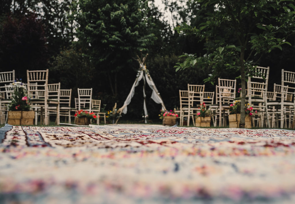 Naked Tipi Ceremony Backdrop Flowers Fabric Rugs Aisle DIY Boho Wedding Jade Maguire Photography