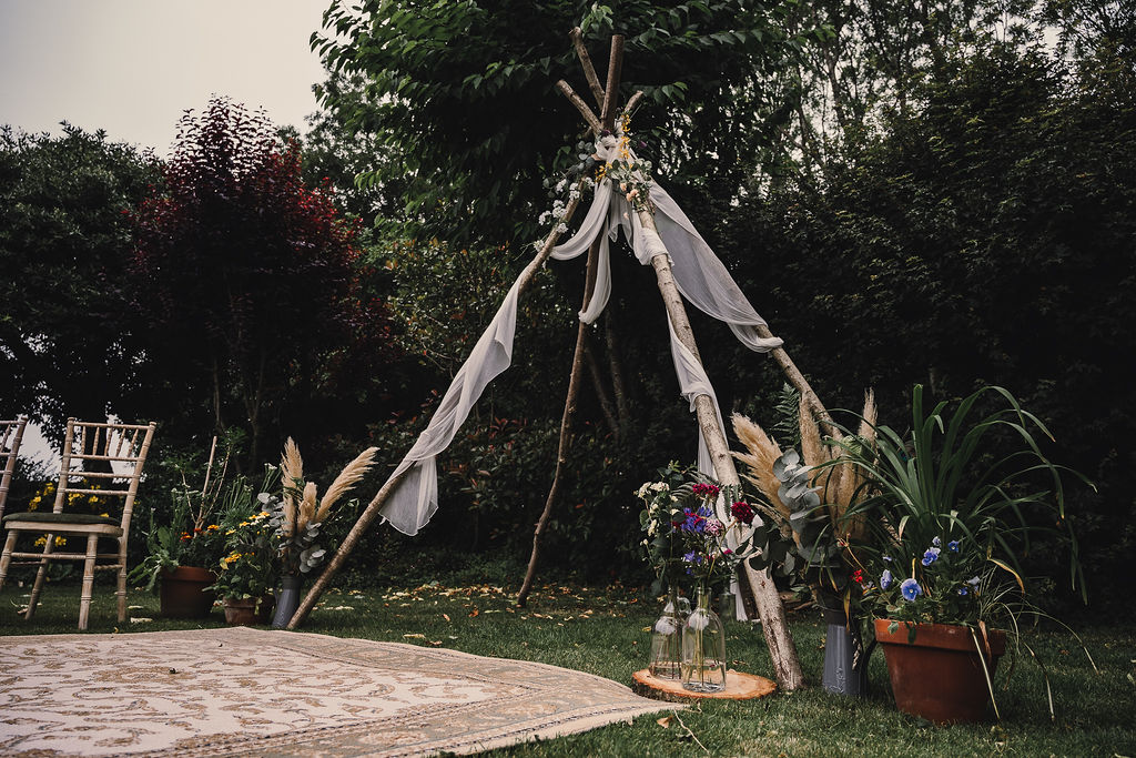 Naked Tipi Ceremony Backdrop Flowers Fabric DIY Boho Wedding Jade Maguire Photography