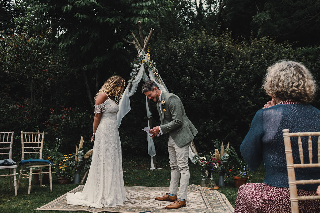 Naked Tipi Ceremony Backdrop Flowers Fabric Rugs Aisle DIY Boho Wedding Jade Maguire Photography
