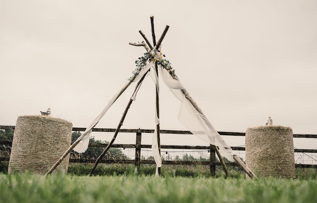 Naked Tipi Ceremony Backdrop Flowers Fabric DIY Boho Wedding Jade Maguire Photography