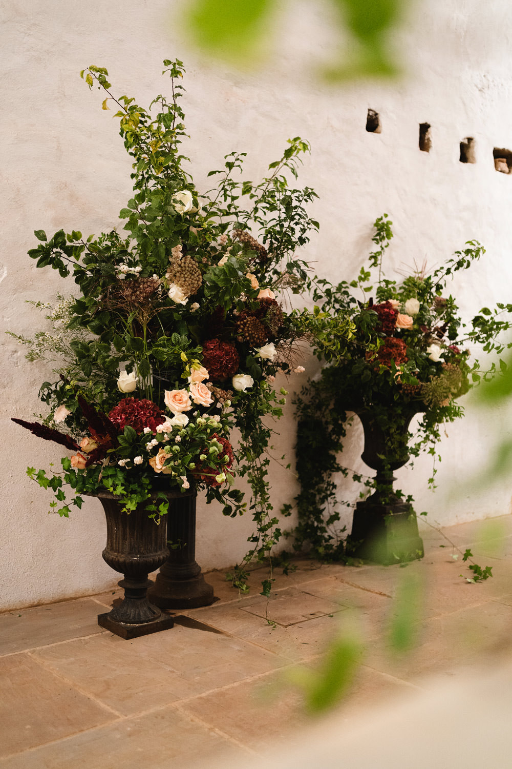 Medieval Barn Wedding Sam Gibson Photography Tall Urn Flower Arrangements Wild Winter Burgundy