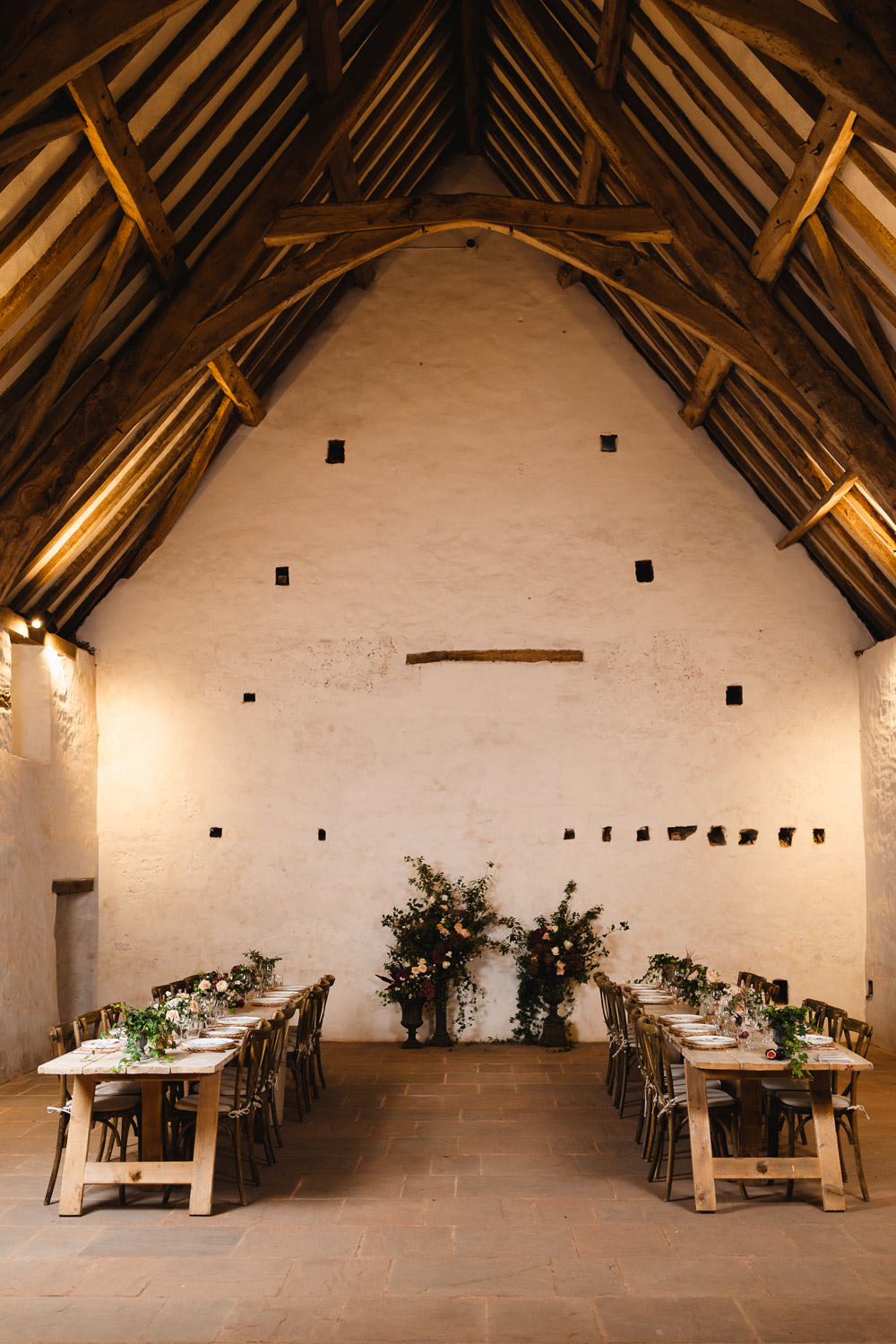 Long Wooden Tables Greenery Flowers Runner Rustic Rattan Place Mats Medieval Barn Wedding Sam Gibson Photography