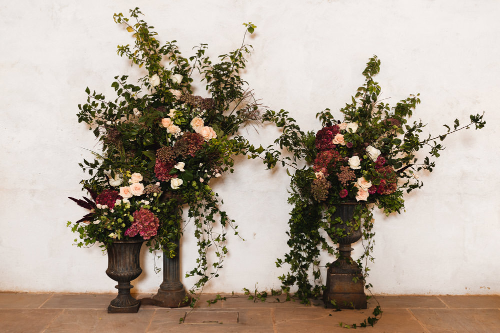Tall Urn Flower Arrangements Wild Winter Burgundy Medieval Barn Wedding Sam Gibson Photography