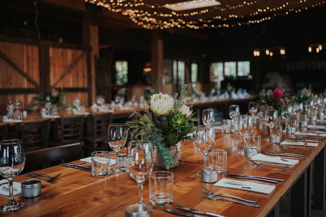 Barn Reception Wooden Tables Fairy Light Canopy Rustic New Zealand Wedding PIA Photo Film