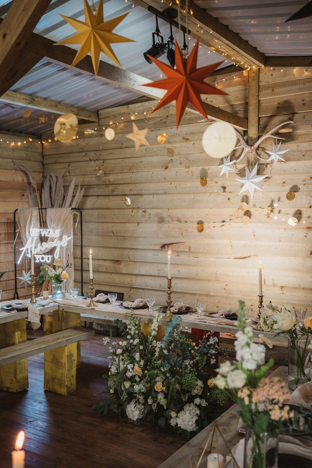 Upthorpe Wood Wedding Emily Tyler Photography Log Cabin Barn Decor Stars Cosy Scandi Wooden Tables Greenery