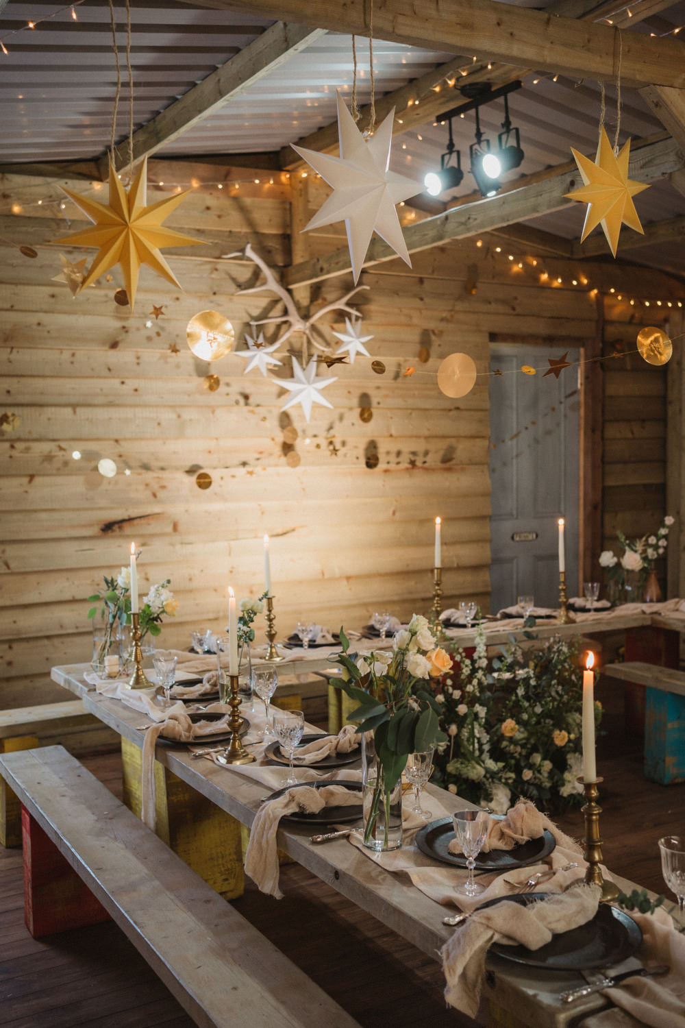 Log Cabin Barn Decor Stars Cosy Scandi Wooden Tables Greenery Upthorpe Wood Wedding Emily Tyler Photography