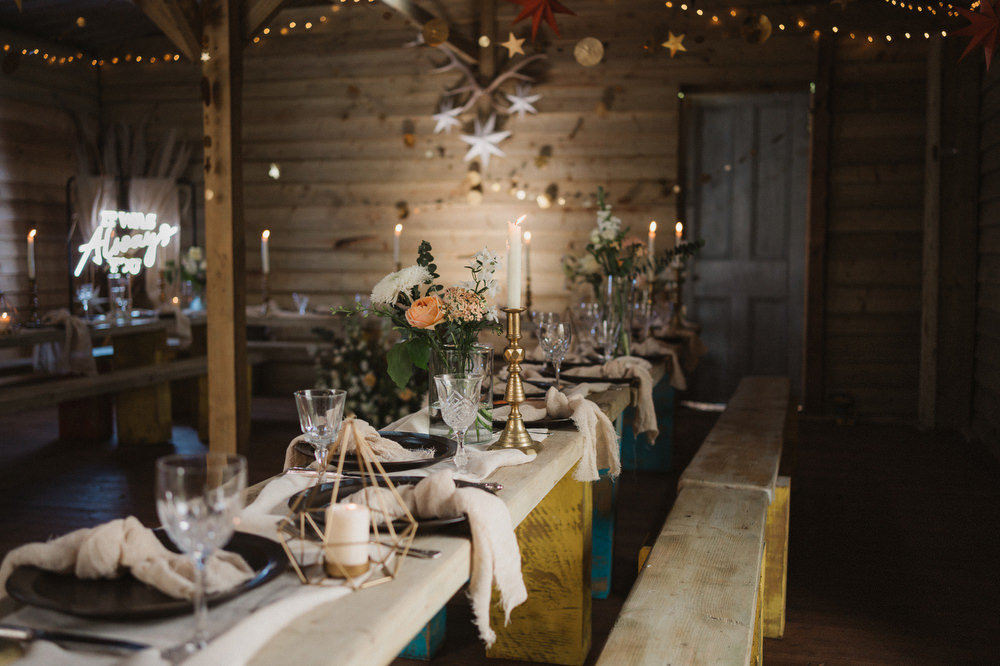 Log Cabin Barn Decor Stars Cosy Scandi Wooden Tables Greenery Upthorpe Wood Wedding Emily Tyler Photography