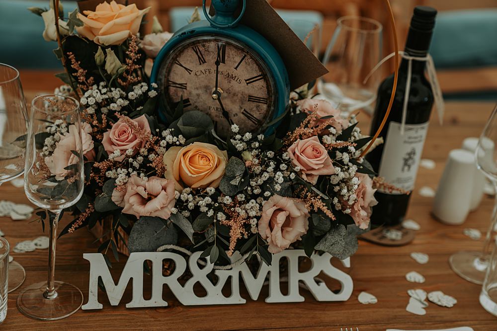 Table Centrepiece Decor Flowers Clock Alice in Wonderland Whimsical Wonderland Wedding Amber Louise Photography