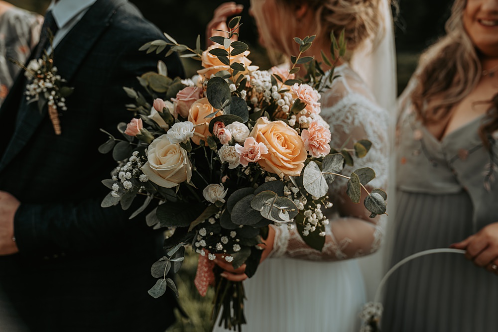 Bouquet Flowers Bride Bridal Coral Rose Whimsical Wonderland Wedding Amber Louise Photography