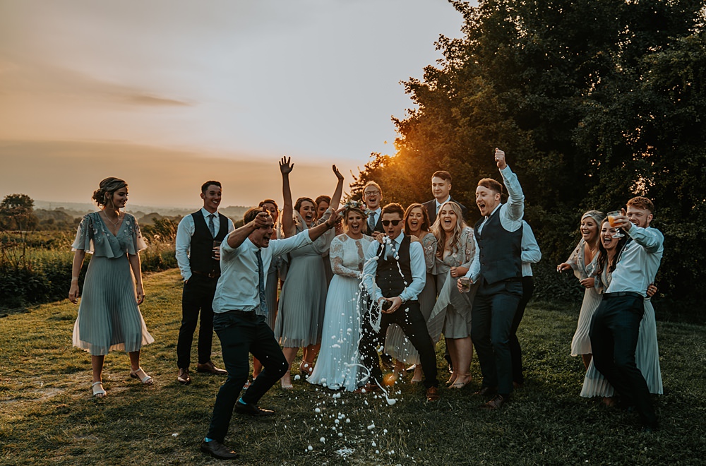 Champagne Spray Whimsical Wonderland Wedding Amber Louise Photography